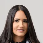Dr. Nelvis Suarez, DMD, FACE, FAGD, FIADFE, FACDS